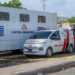 Hallan cuerpo de un dominicano dentro de un camión averiado en el parqueo trasero de Migración